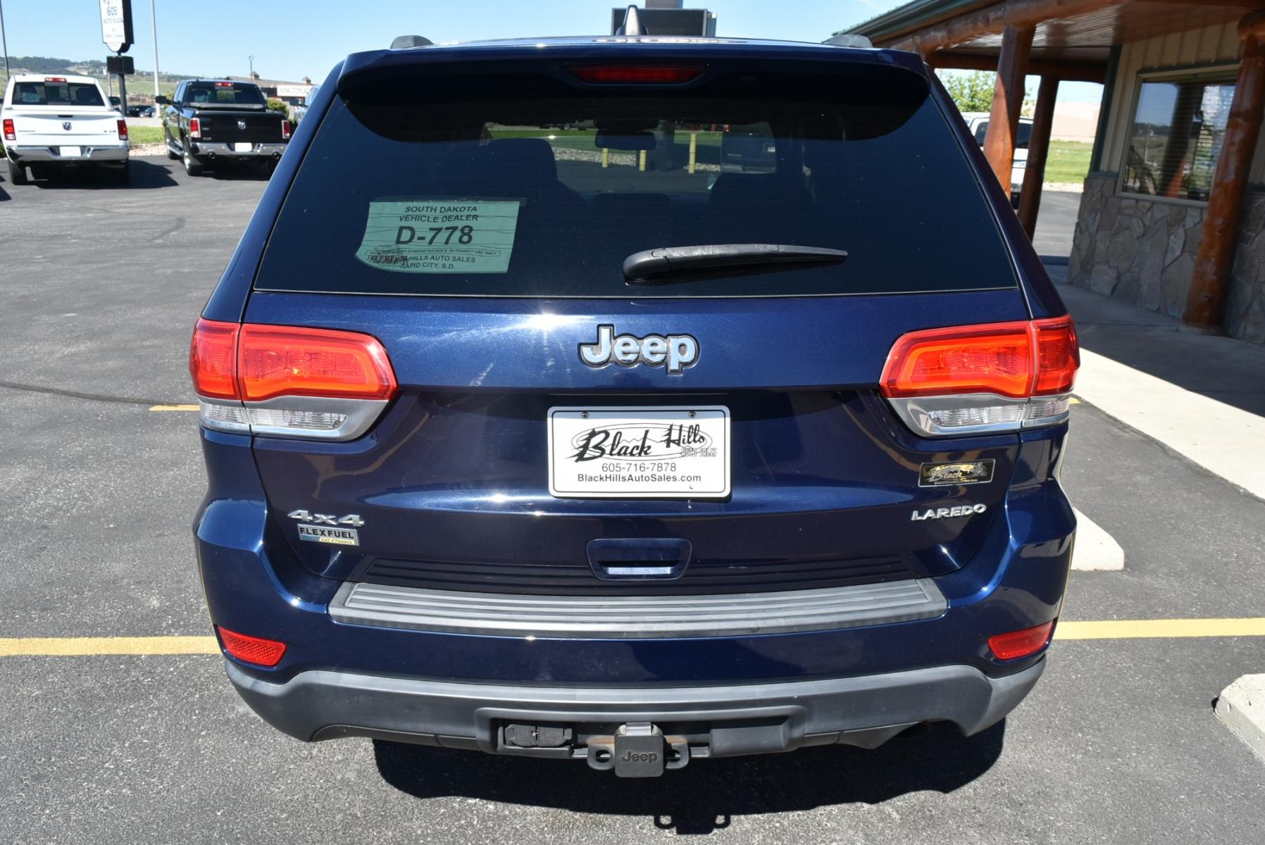 2014 Blue /Black Jeep Grand Cherokee Laredo (1C4RJFAG6EC) with an 3.6L V6 24 Valve VVT engine, 8-Speed Automatic transmission, located at 1600 E Hwy 44, Rapid City, SD, 57703, (605) 716-7878, 44.070232, -103.171410 - Photo #6